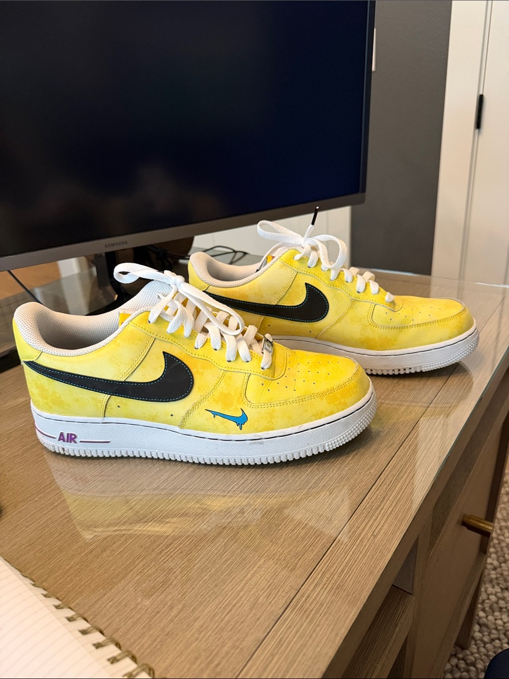Nike Air Force 1 Low-Top Yellow Sneakers with Black Swoosh and Blue Accent